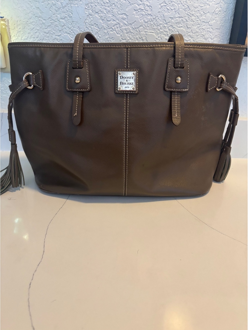 Dooney & Bourke Brown Pebbled Leather "Davis" Tassel Tote Bag